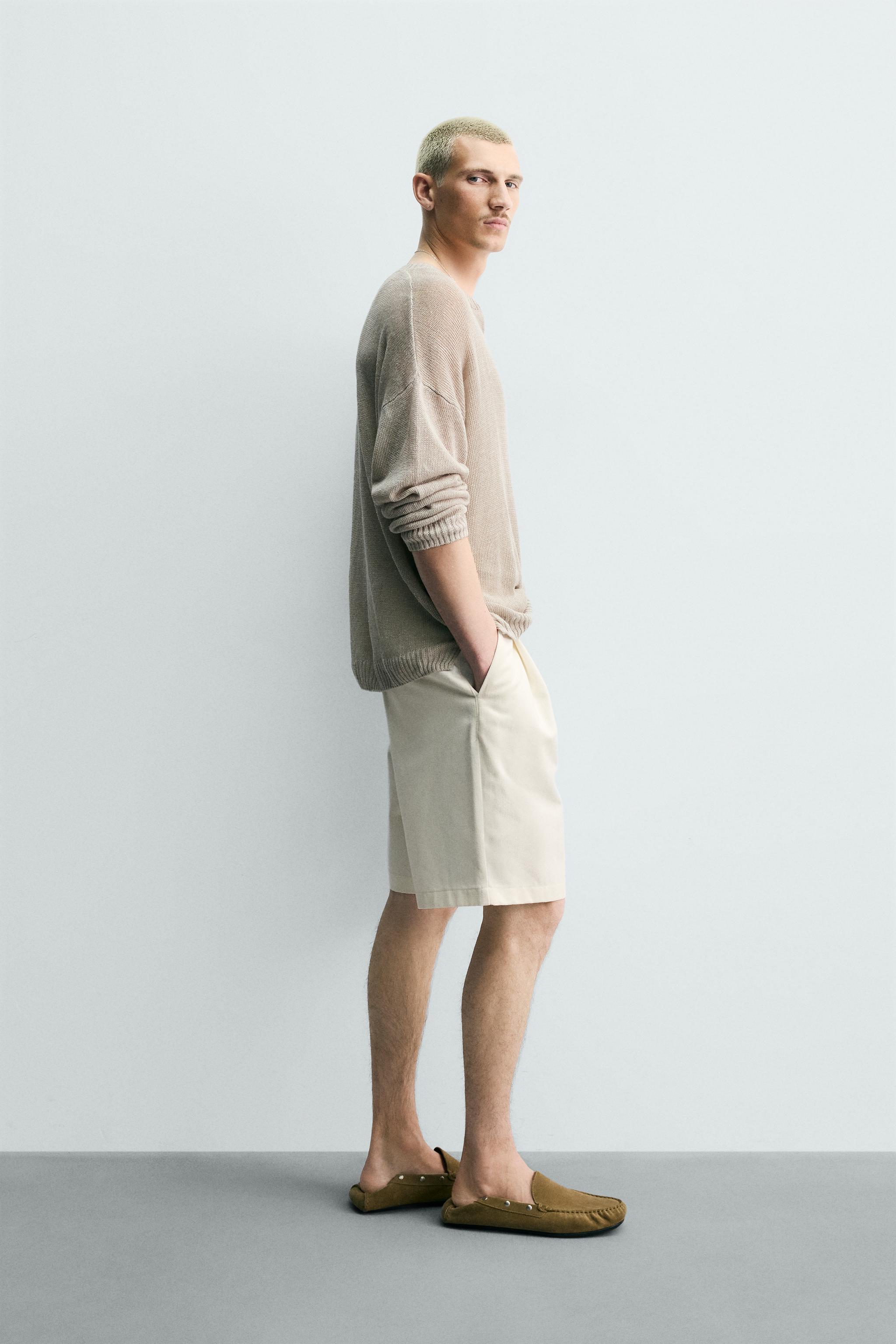 RELAXED FIT PLEATED BELTED SHORTS